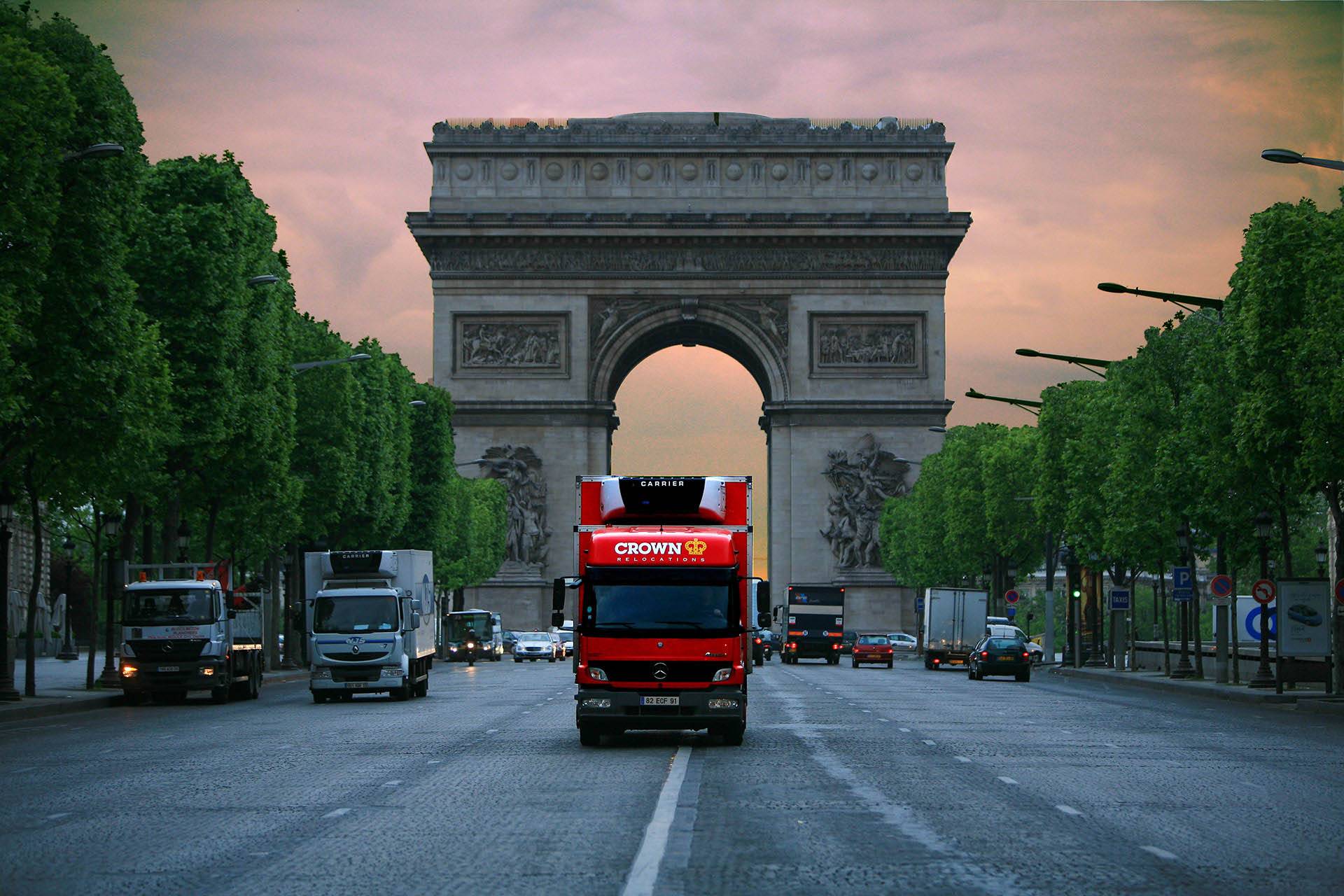 Crown Removal truck driving through Paris, France